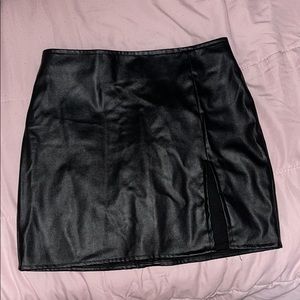 Black leather mini skirt